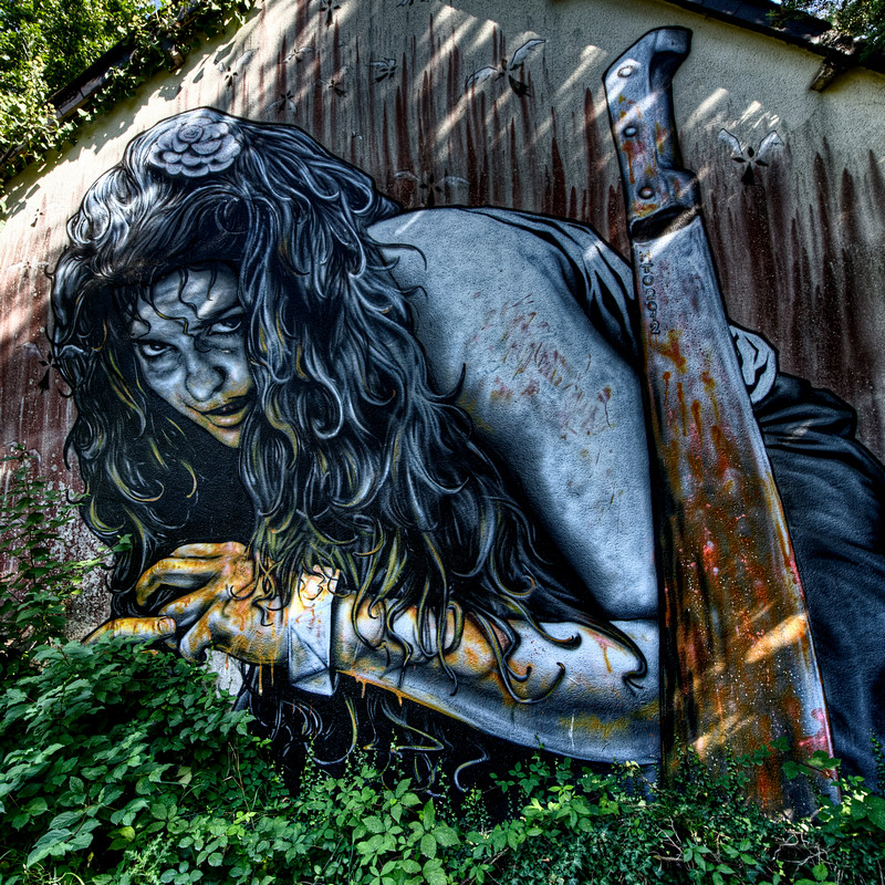 street art, une femme avec un regard menaçant